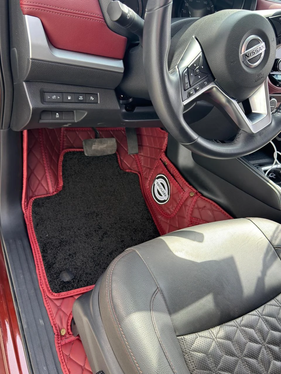 Custom red 7D car floor mats installed in Oman