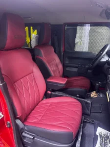 Custom red front seat upholstery